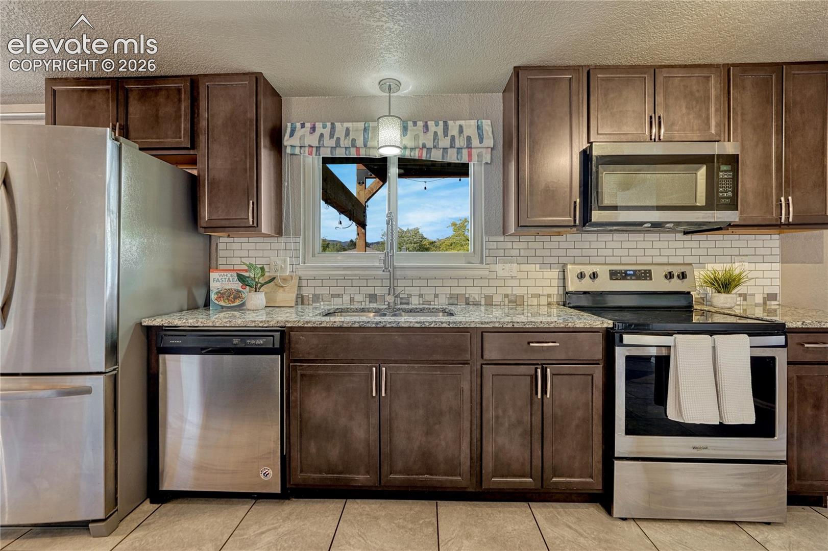 Easy care tile floors in kitchen.