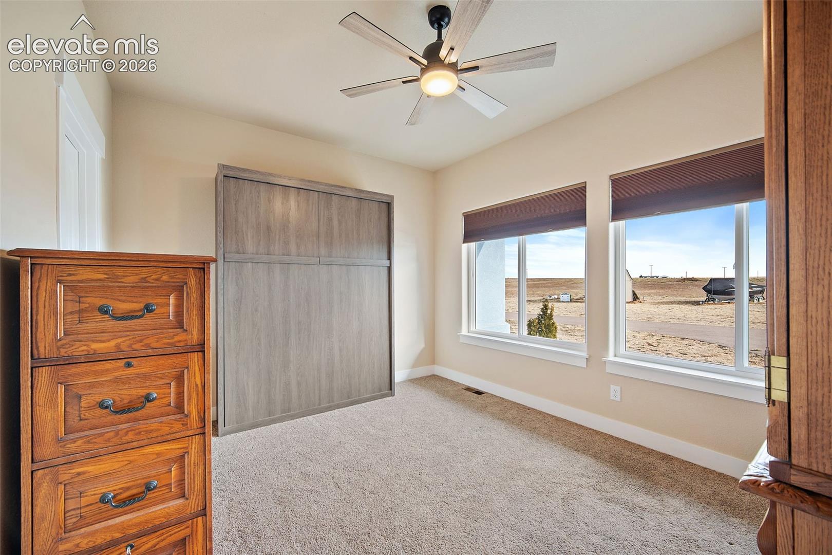 3rd main level bedroom with murphy bed