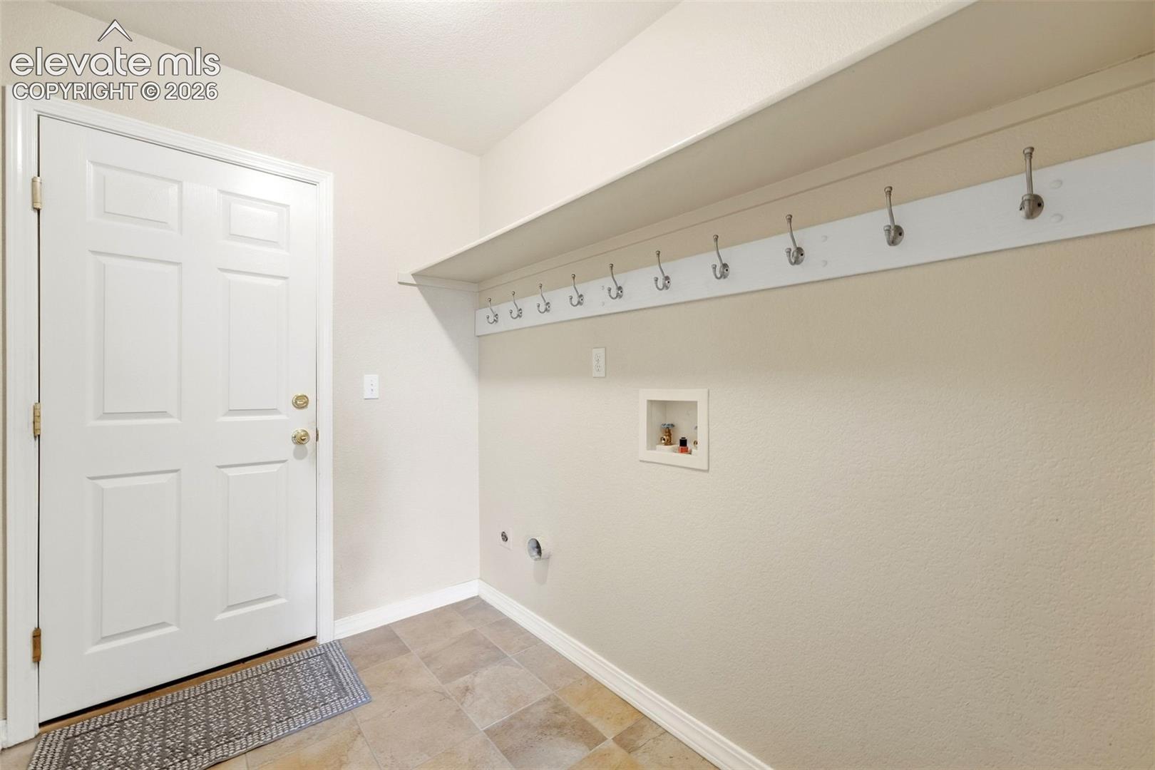 Main Level Laundry, Door to Garage

