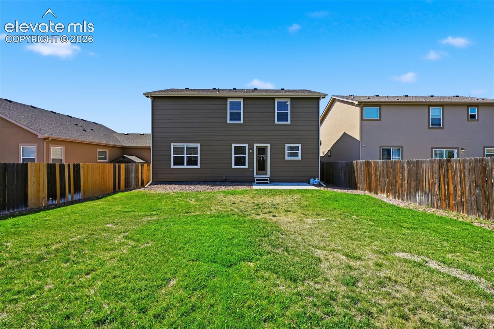 The concrete patio creates an easy spot for grilling, outdoor dining or relaxing on Colorado evenings.