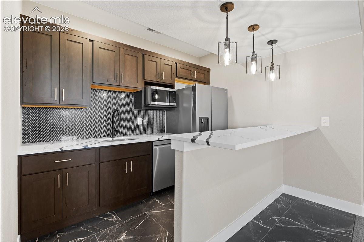 This is the same floor plan, built by the same builder, in the same neighborhood. Finishes will vary based on buyer's custom selections.
