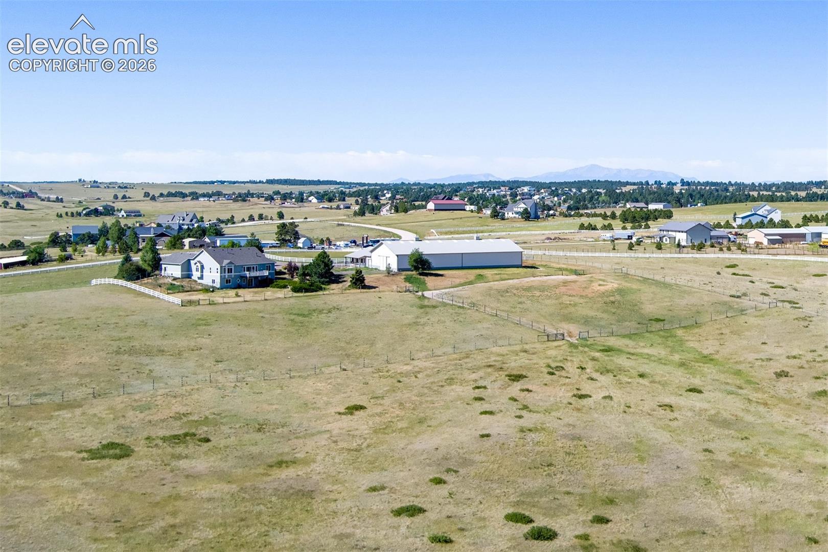 Mountain Views In The Background, Middle Fence Across The Property, Back Fence Not Shown