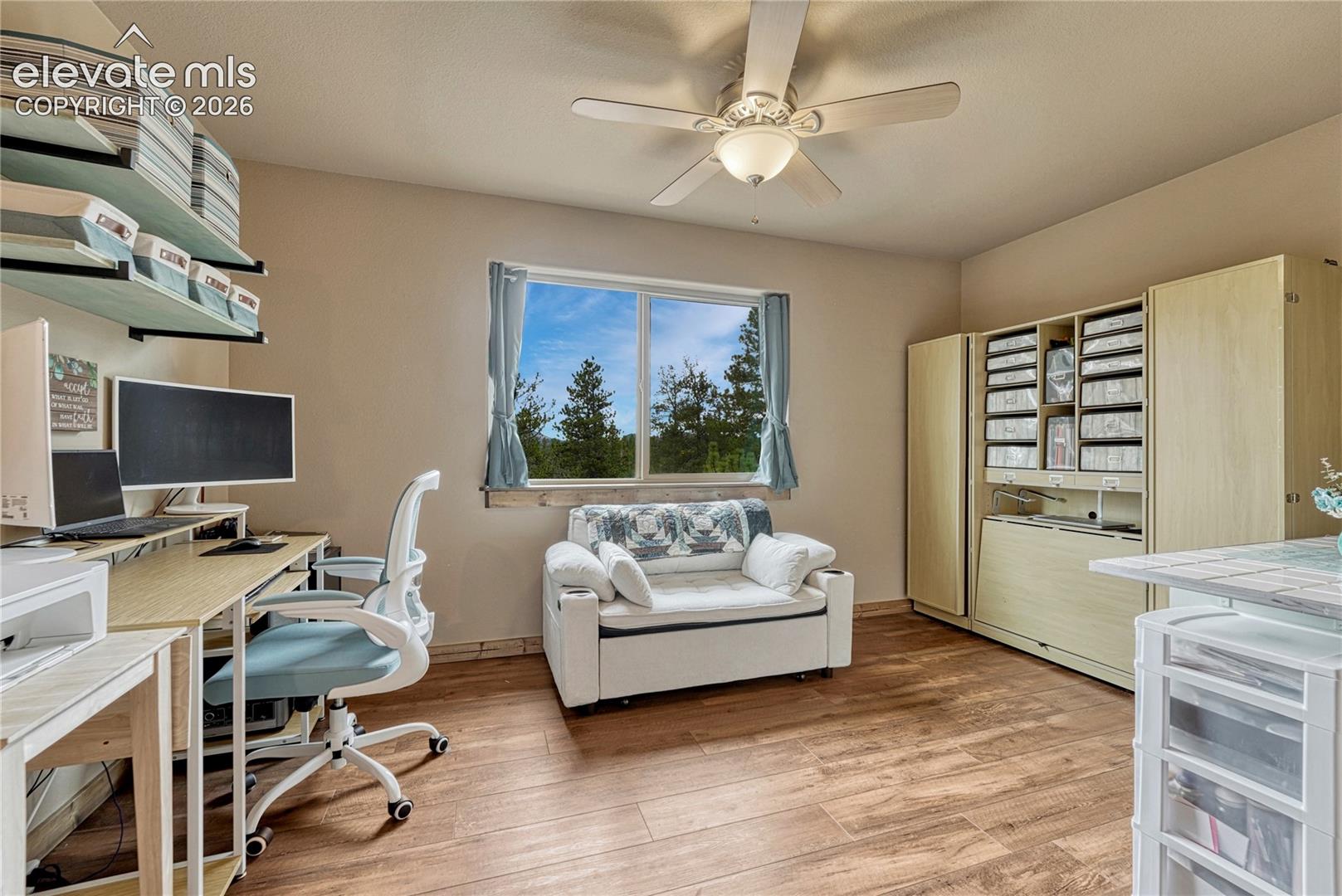 Room featuring wood-finish flooring