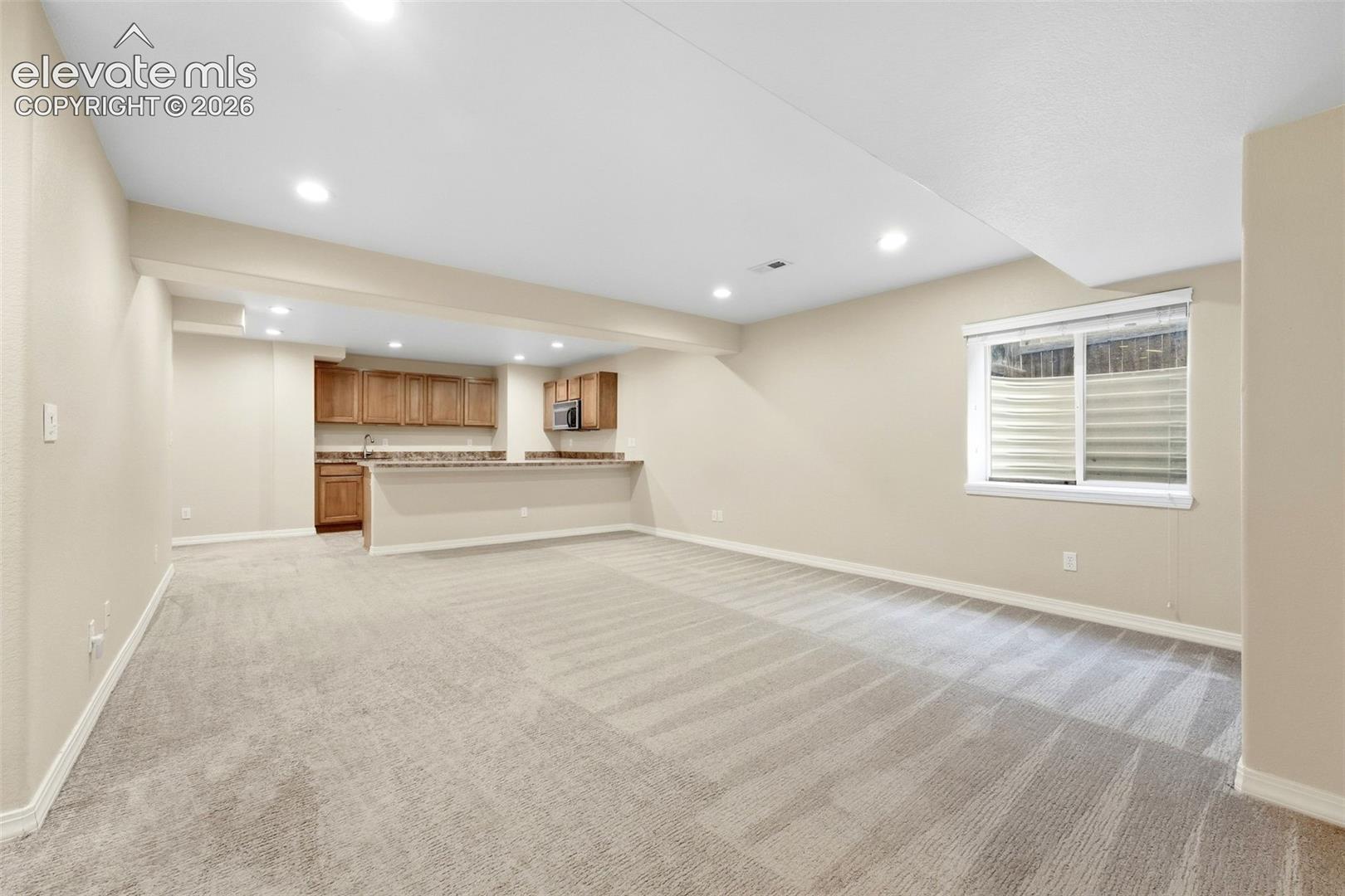 View of Kitchenette from Family Room in Basement