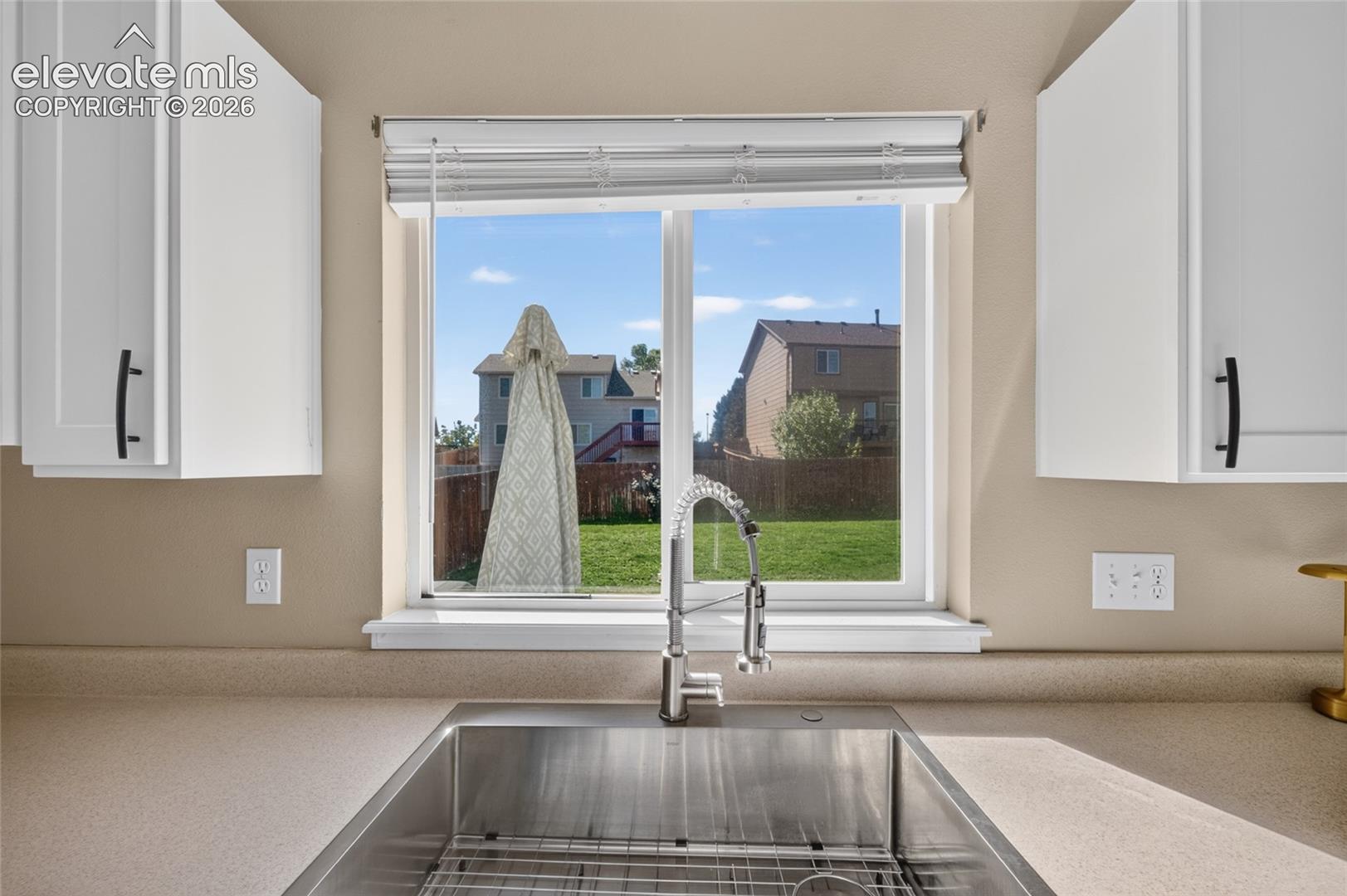New kitchen sink overlooking the backyard