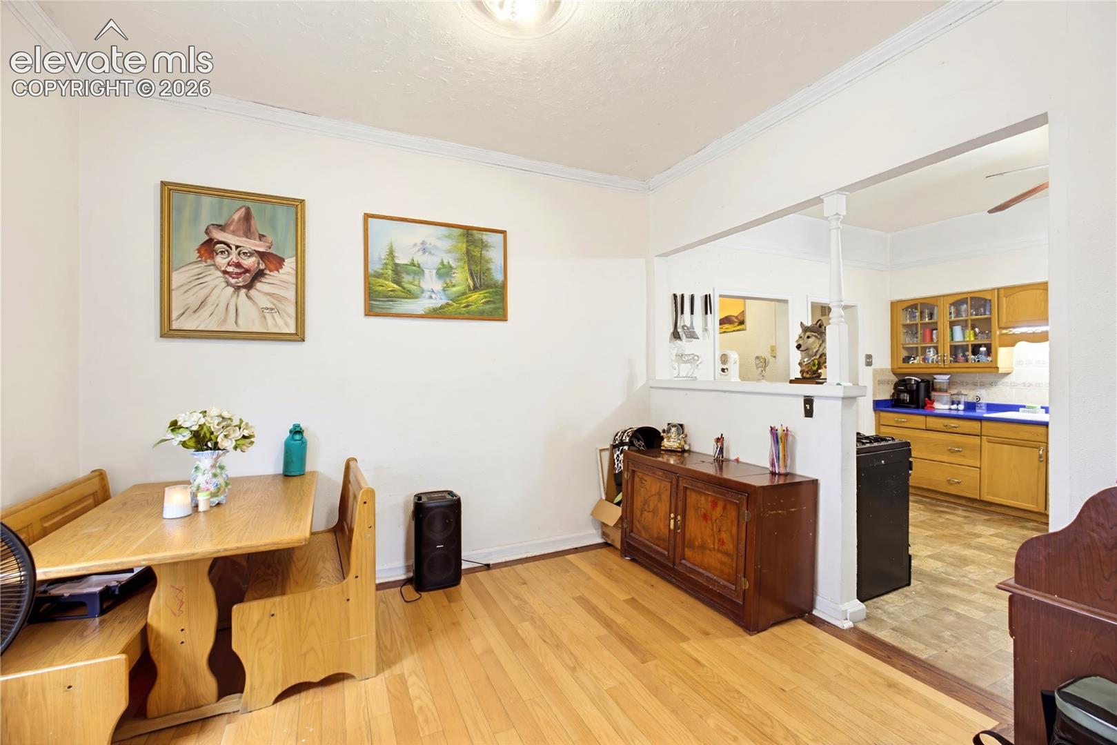 Hardwood flooring throughout the dining area