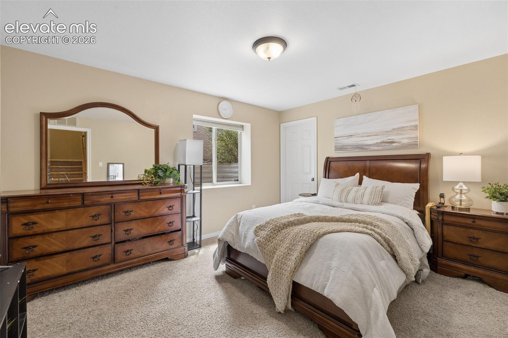 Basement bedroom w/ walk-in closet, adjacent 3/4 bath not shown
