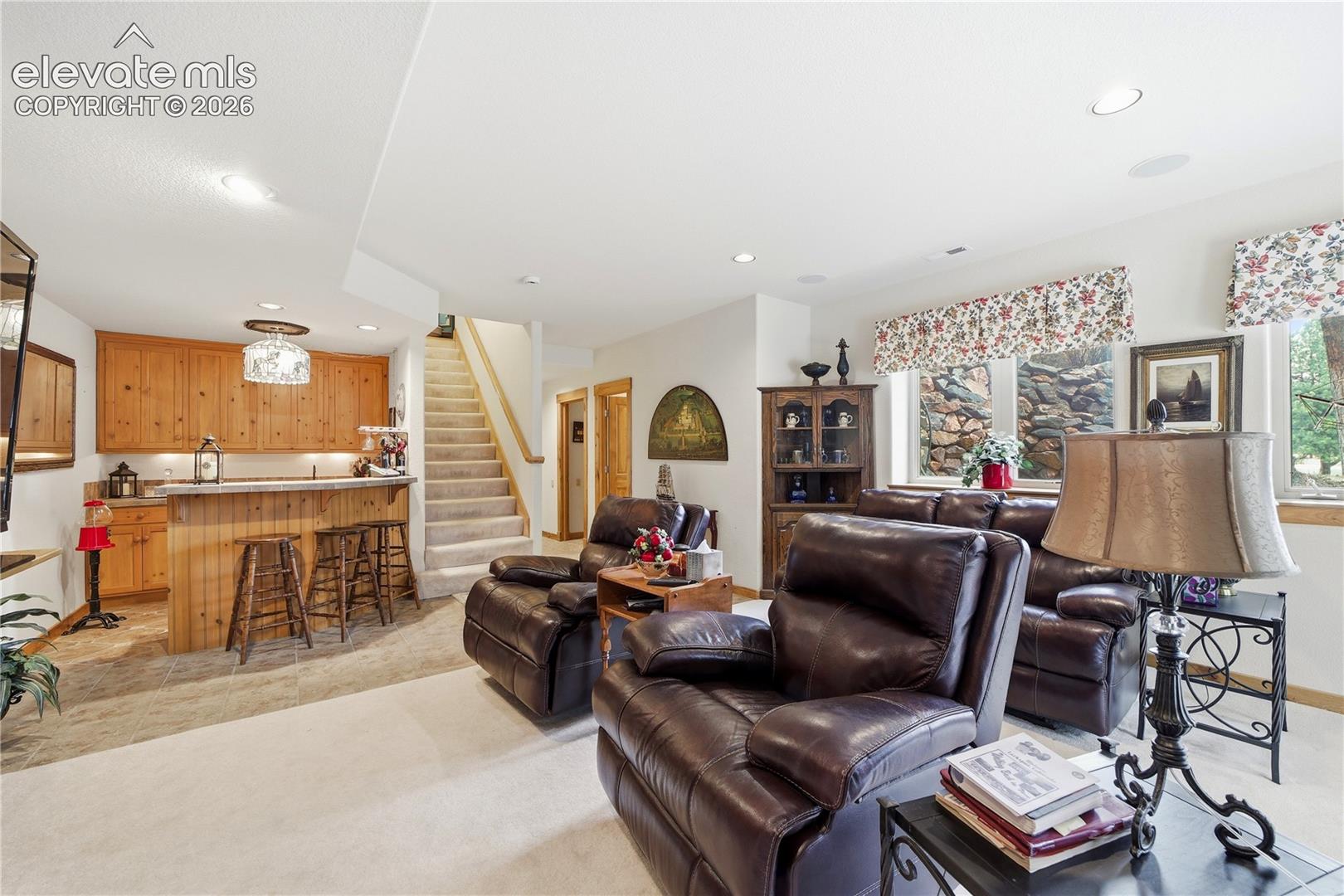 Lower level Family Room with Walk Out to Side Patio