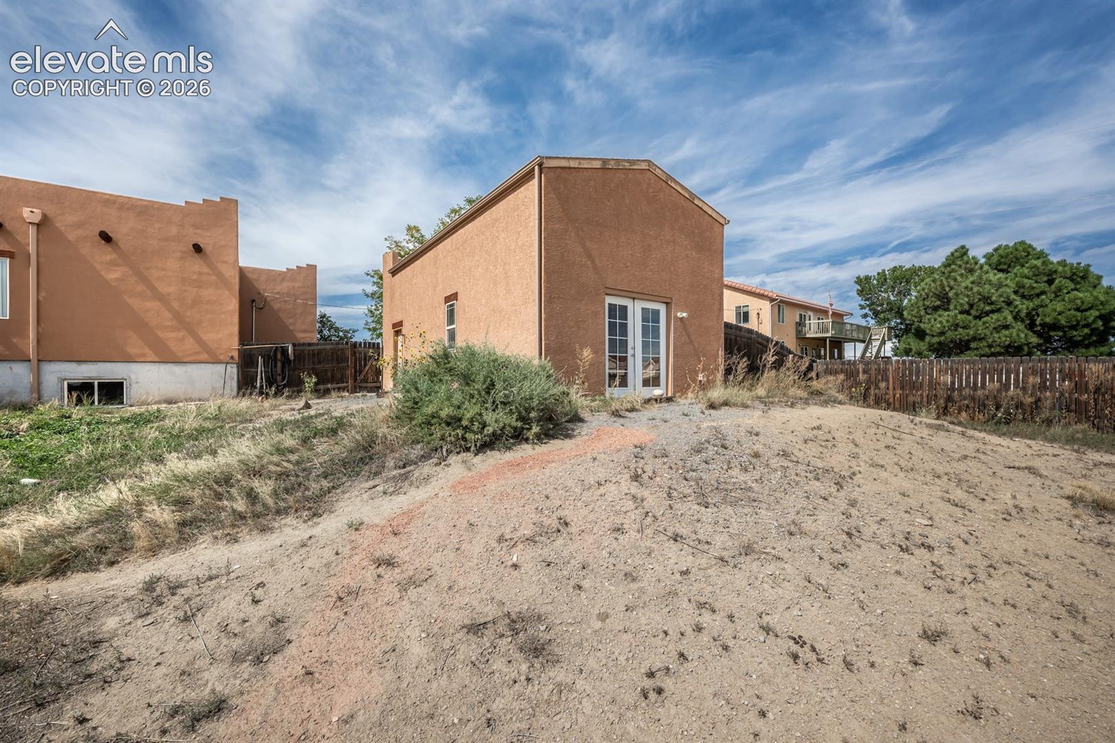 1.4 acres home is fully fenced with 2 areas front and back.