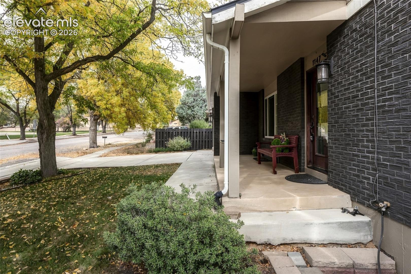 Enjoy talking to the neighbors from the front patio