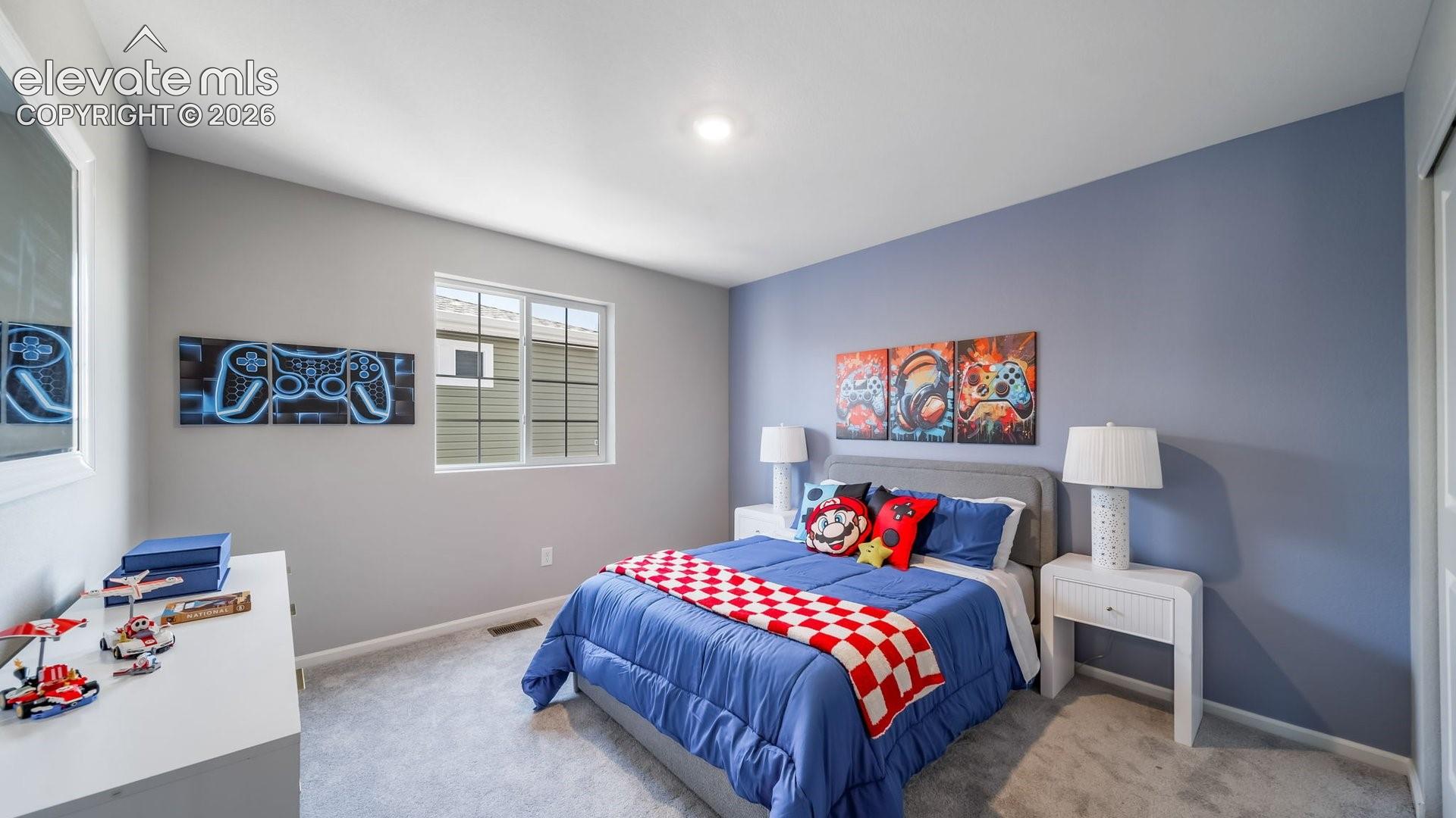 Plush carpeting, a single window with horizontal blinds, and a built-in closet with bifold doors
*photos of a model home*