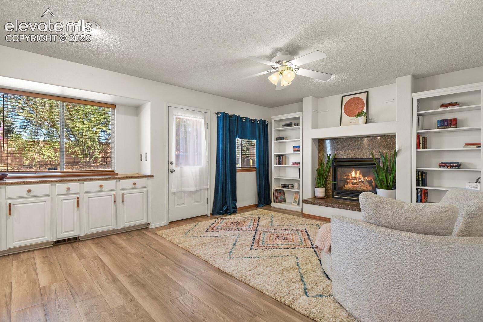 Family Room looking towards door to the backyard and coffee bar area.