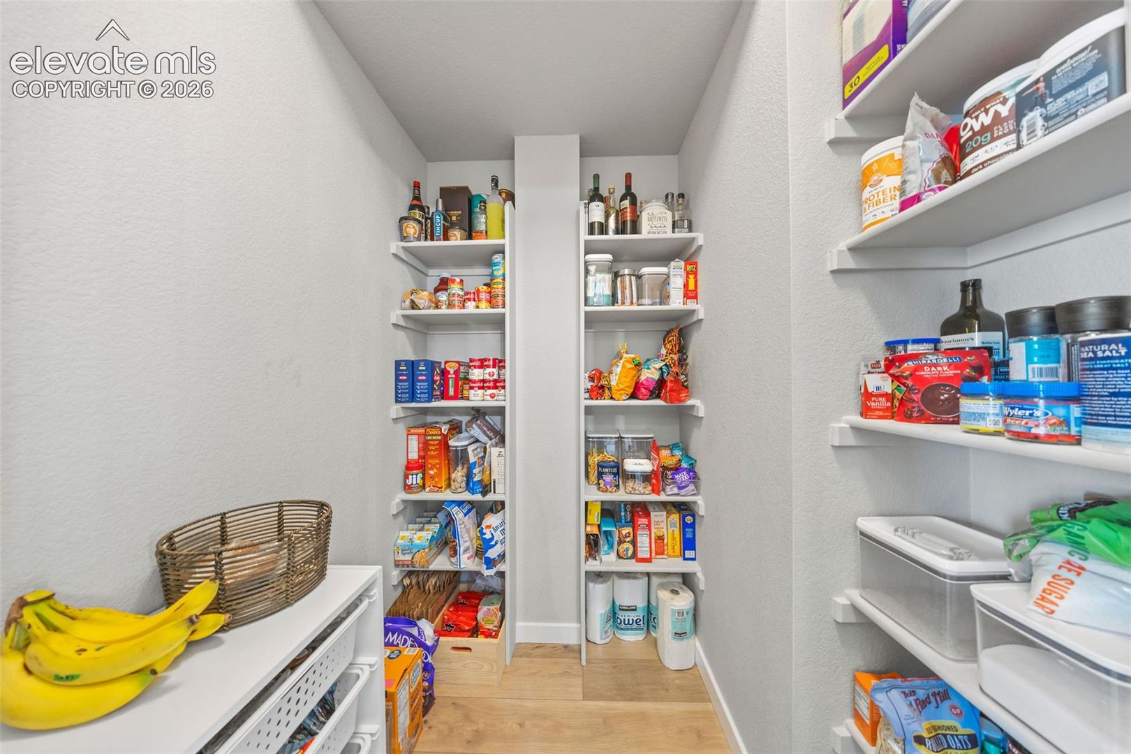 This walk-in pantry offers tons of storage! Costco is nearby and you'll need the space. 