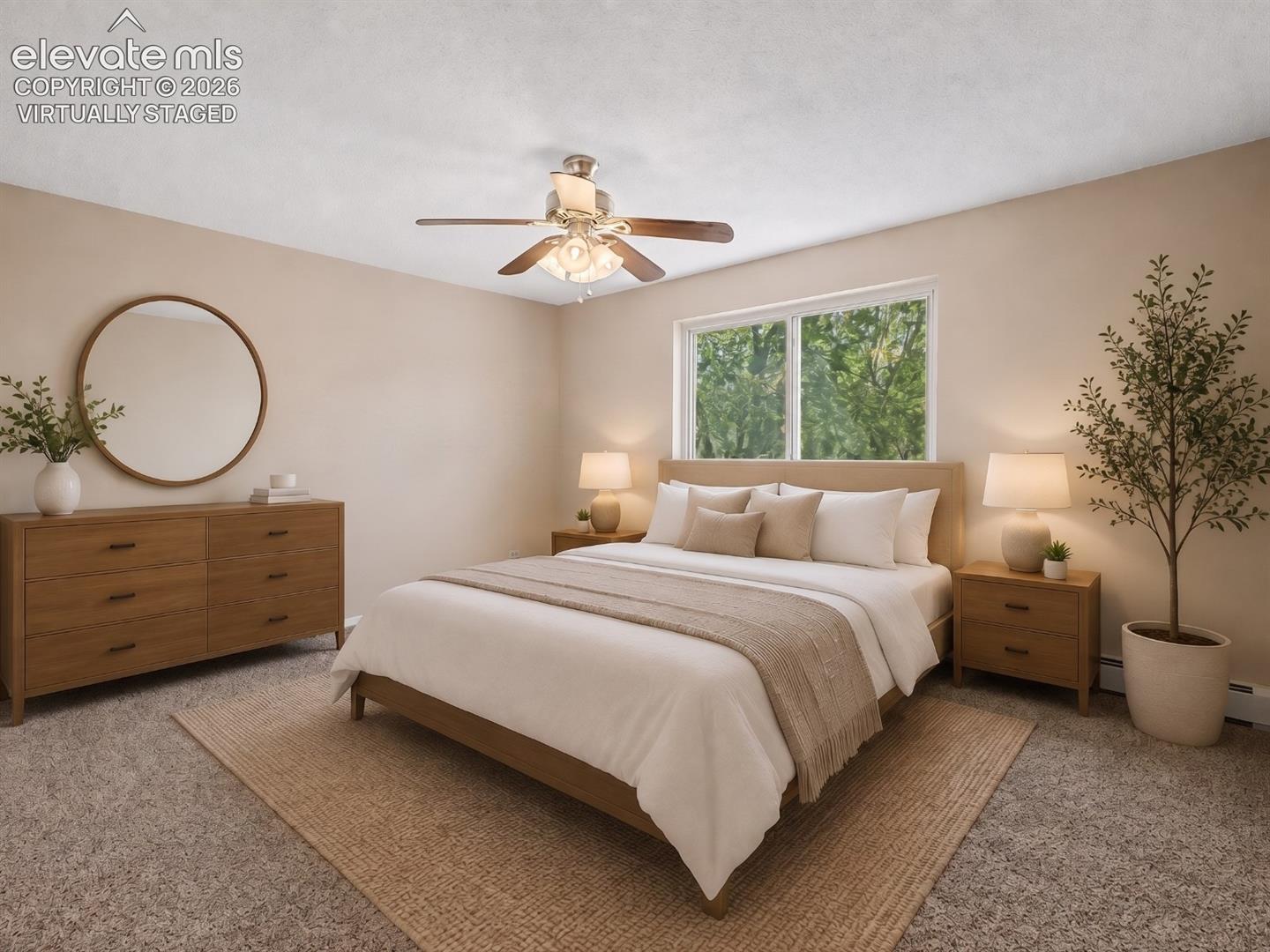 virtually staged Carpeted bedroom featuring a large window, a ceiling fan with integrated lighting, and neutral wall tones