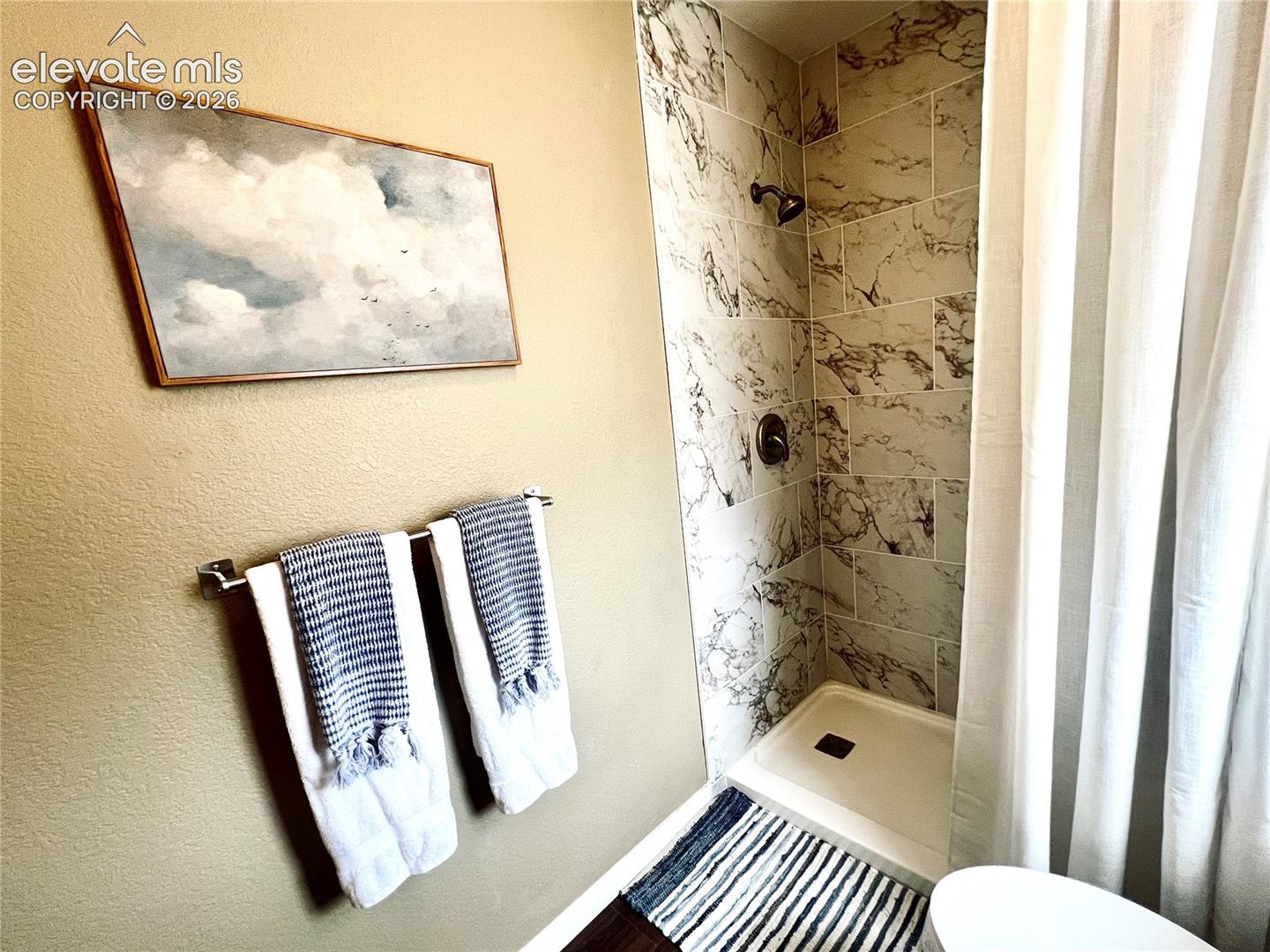 All new features, including the gorgeous walk-in shower!