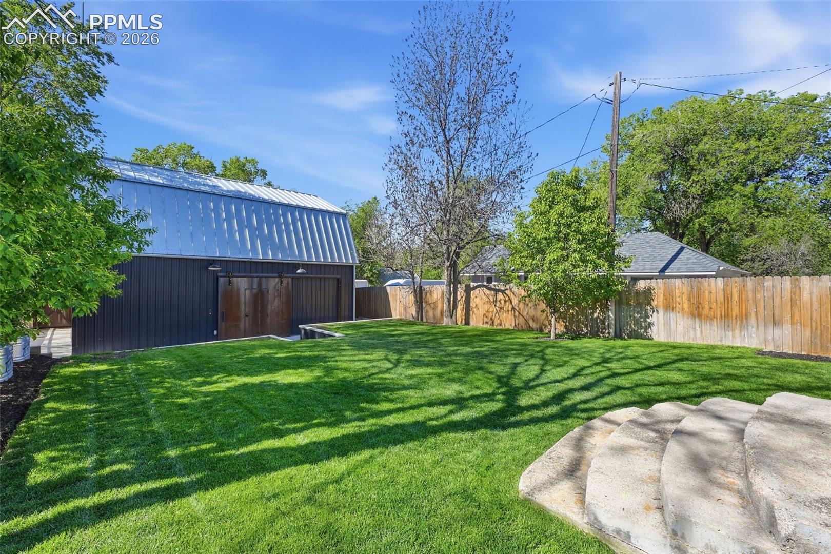 The apartment has no windows facing the rear yard. This helps maintain privacy for the tenants and primary home.