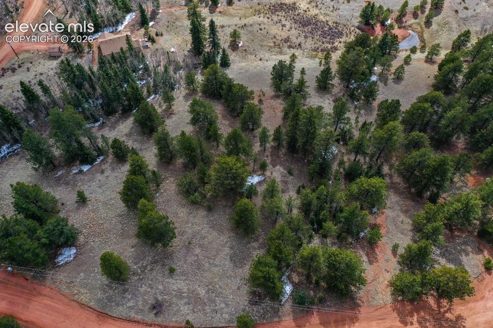 Aerial view featuring a rural view and view of desert