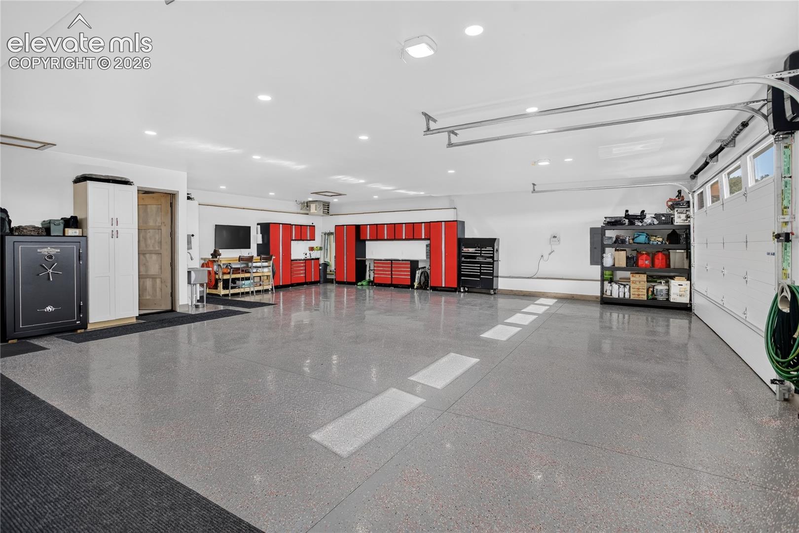 Oversized, heated 3-car garage w/ workshop