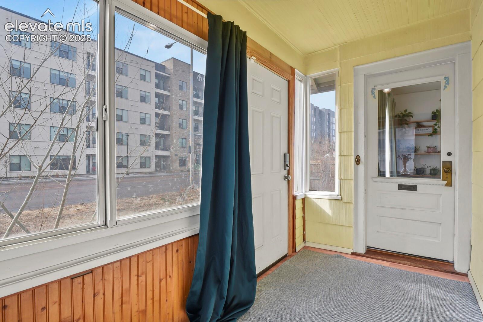 Charming entryway and sunroom
