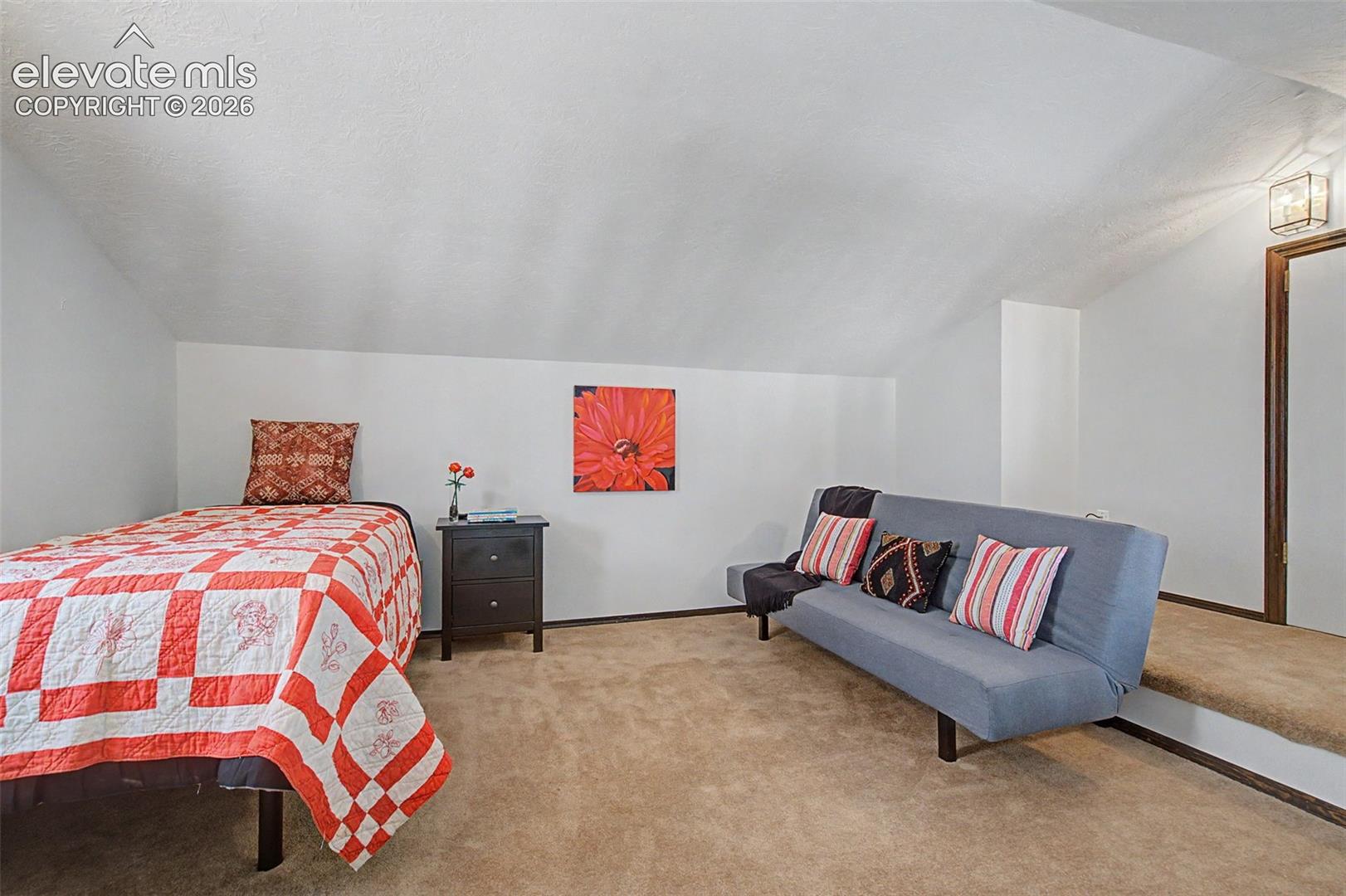 Loft above bedroom w/ attic access.