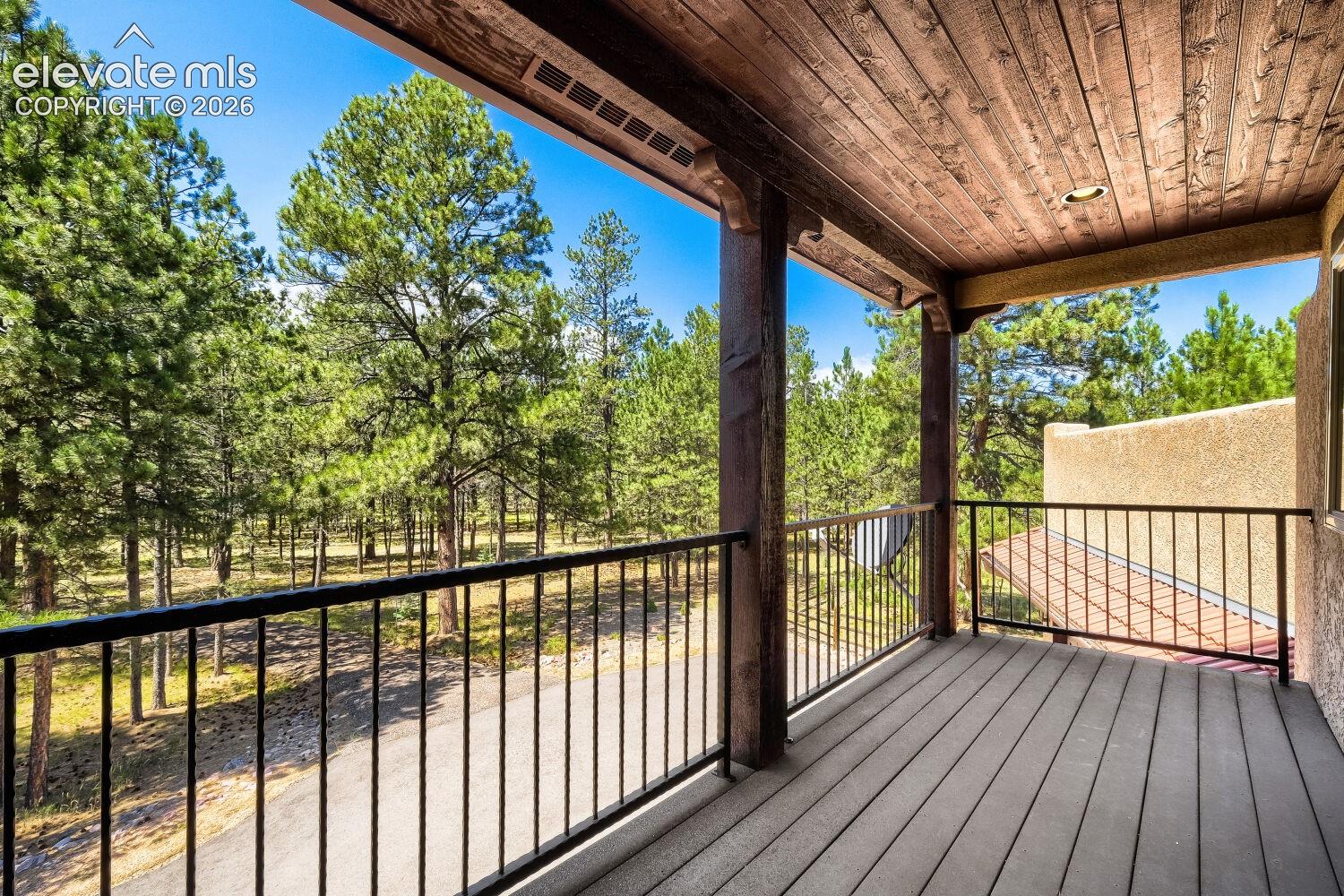 Balcony off primary overlooking trees