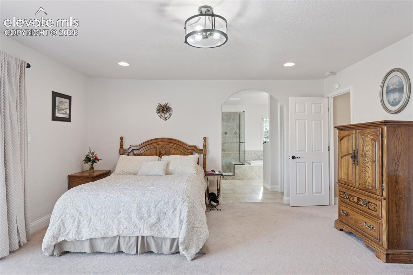 Primary Suite with Private Deck & Hot Tub Access & En Suite Bath