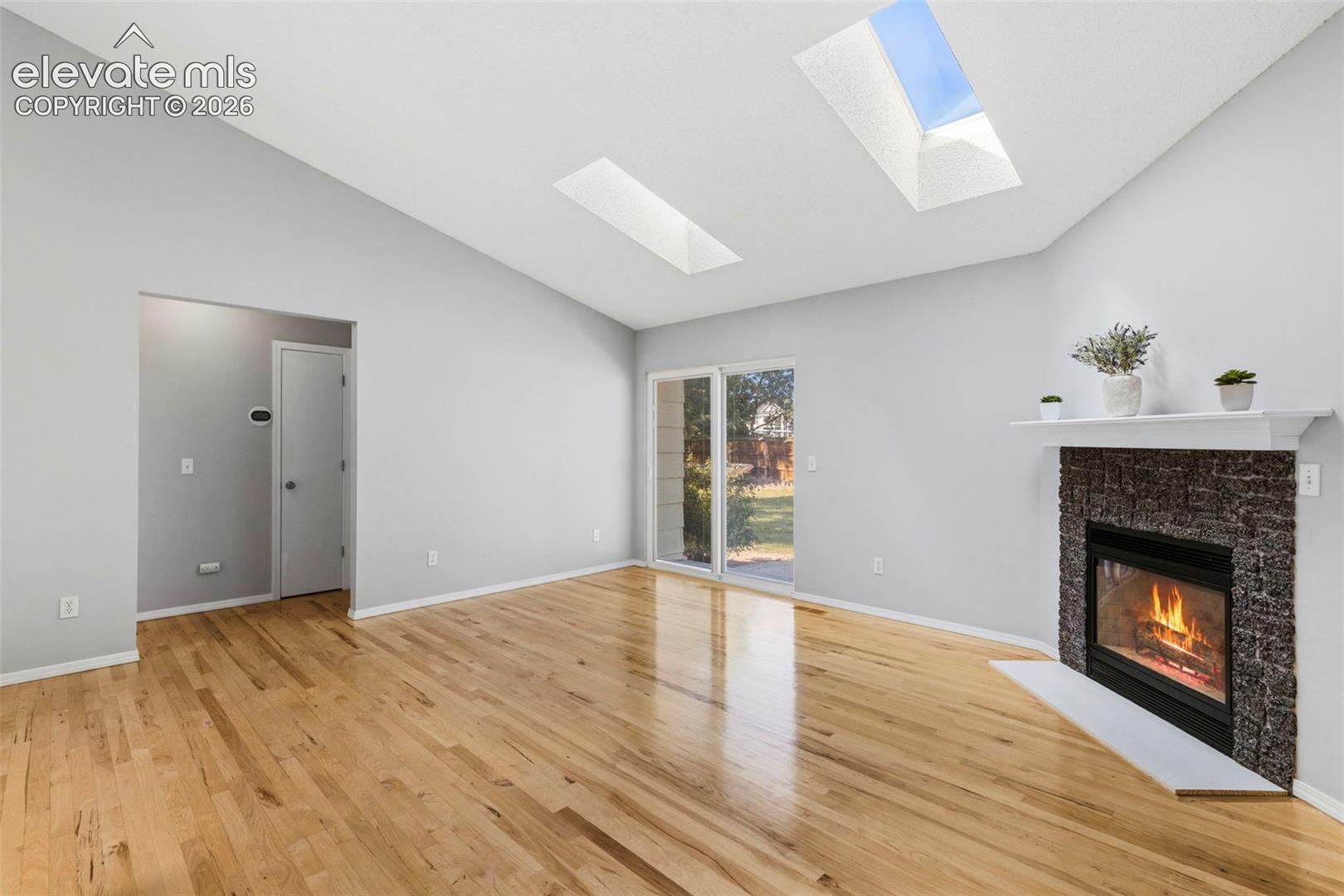 Fireplace and a walk-out to the huge back yard!