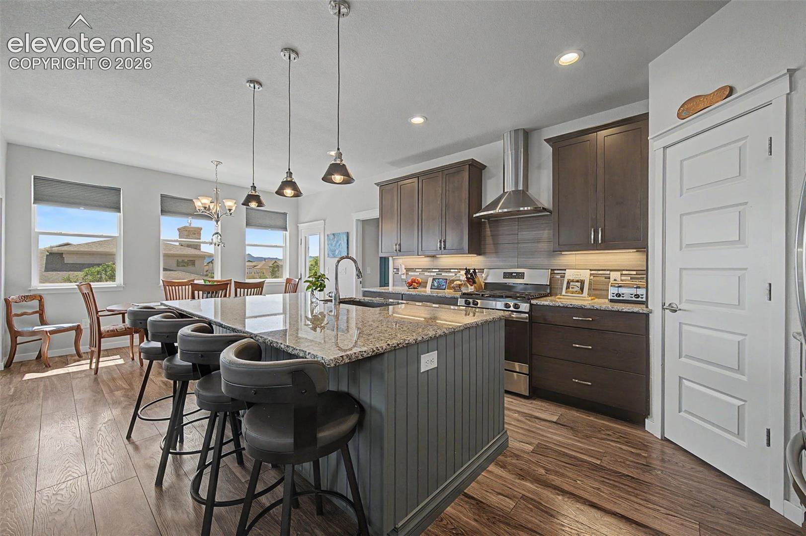 The cooks in the family will really enjoy meal prep in this awesome kitchen with its ample cabinets, granite counters, stainless steel appliances and roomy pantry. 