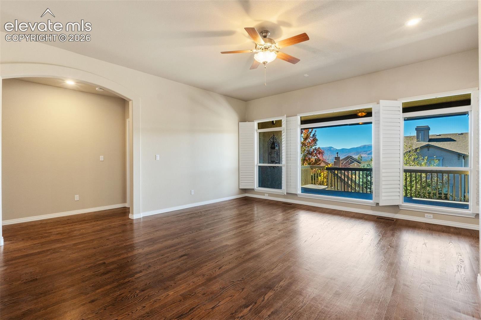 LIVING ROOM WITH AMAZING VIEWS OF PIKES PEAK & FRONT RANGE