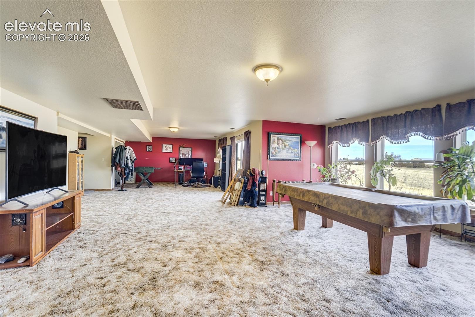 Pool table included.