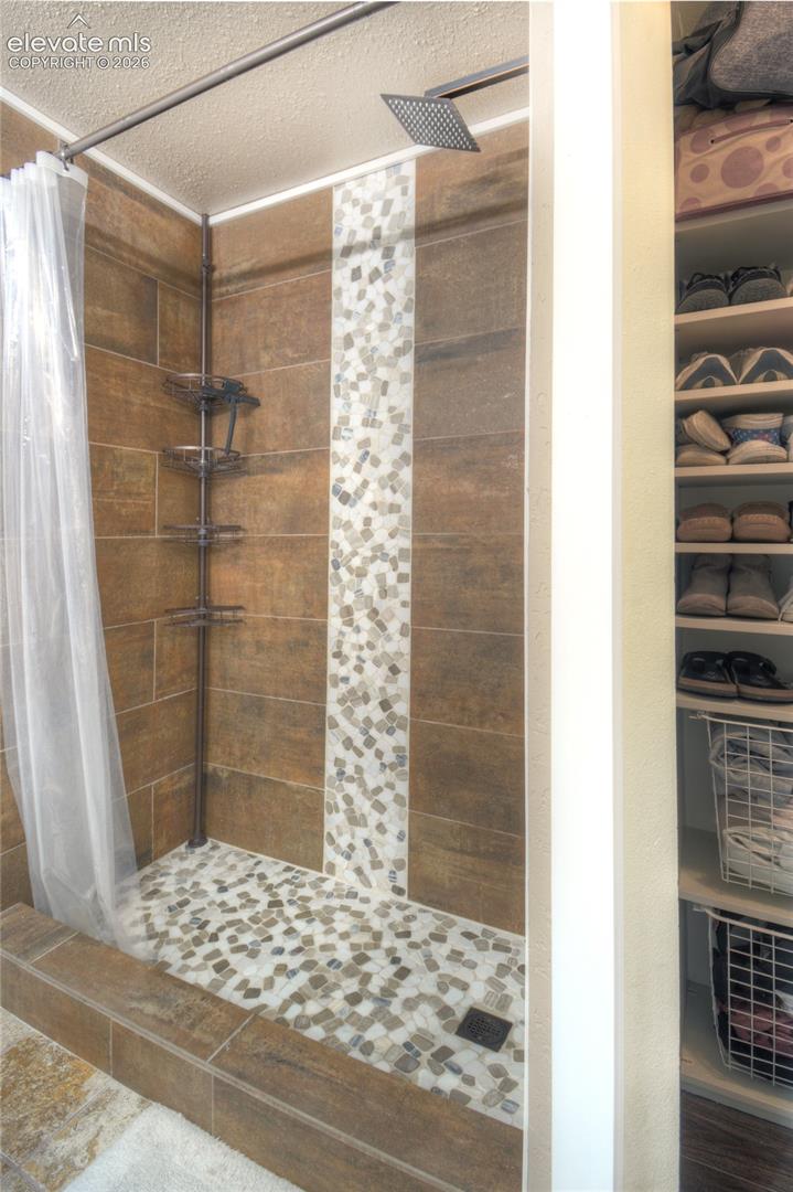Primary bathroom shower.
