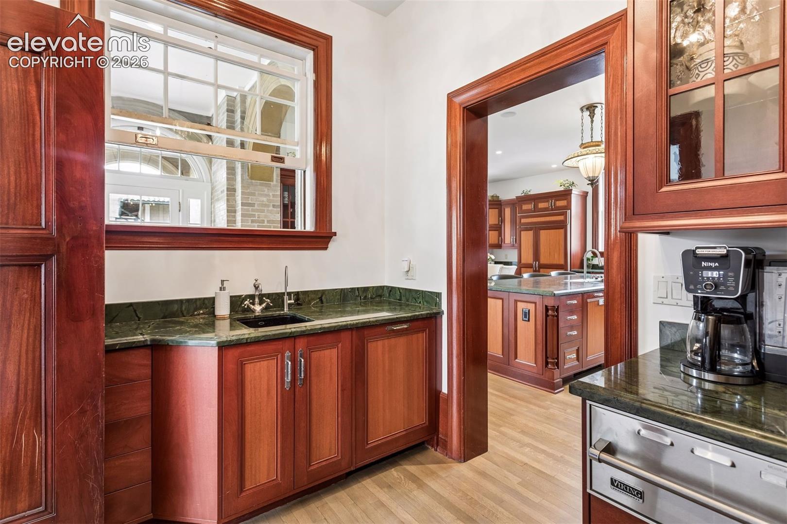 Butlers pantry with sink  and warming drawer