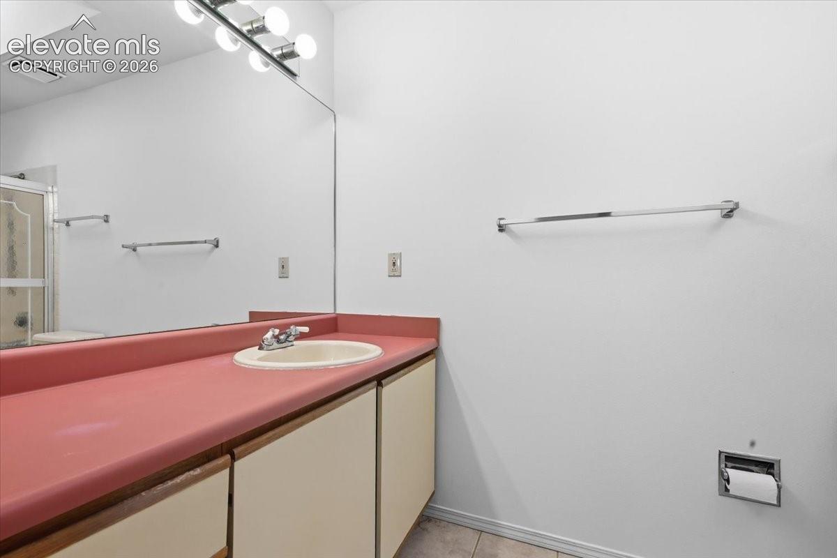 Primary ensuite bathroom vanity at , Colorado Springs, CO.