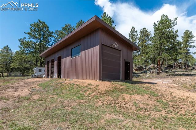 50 X20 4 car garage with large bay door and man door. Plenty of room for all your recreational toys. Bring your boats, ATV's, and RV.