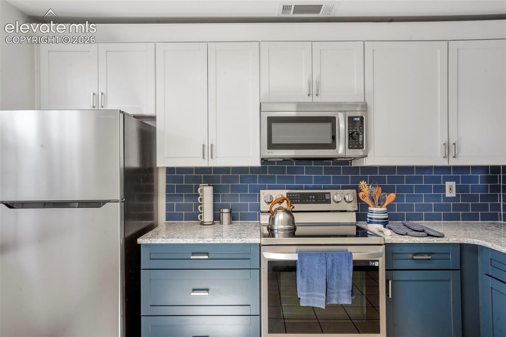 DEEP KITCHEN SINK, BEAUTIFUL BACKSPLASH