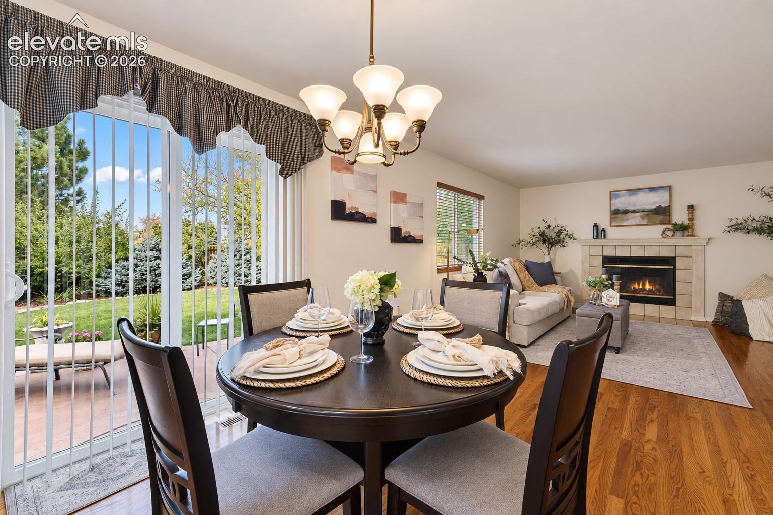 The Dining Area is located off the Kitchen and Family Room with hardwood floors and a slider to the backyard. Great for outdoor entertaining and grilling access
