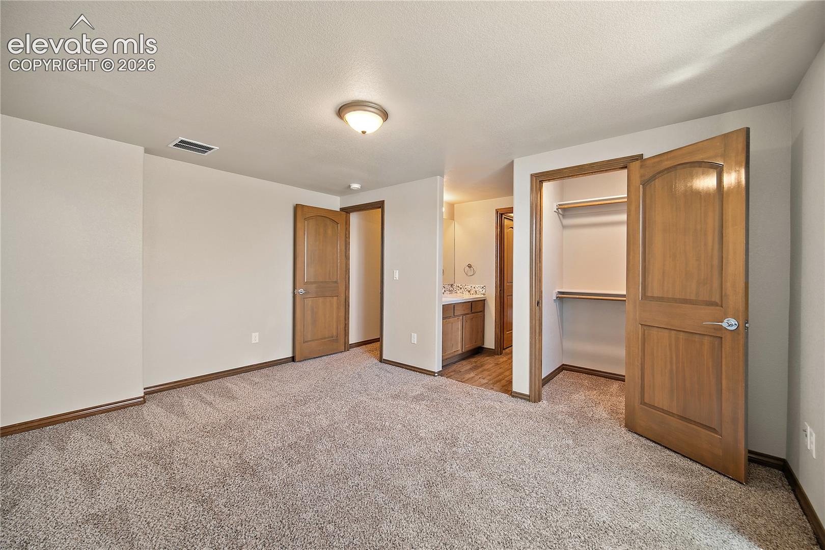 Basement bedroom also with walk in closet and attached Jack n Jill bath. 