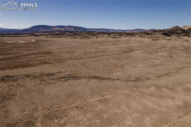 View of mountain background featuring a desert landscape and rural landscape