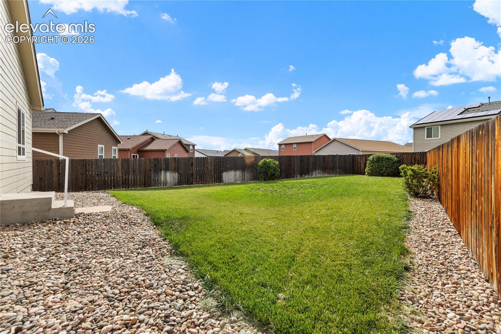 Huge yard- level and fenced!