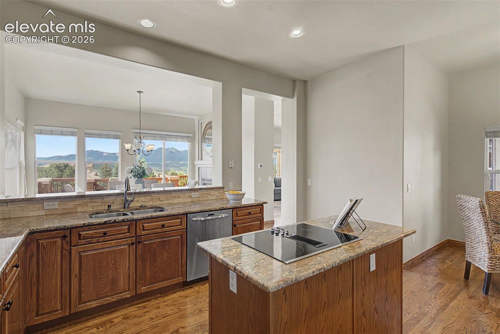Kitchen overlooking the dining room and the mountain views