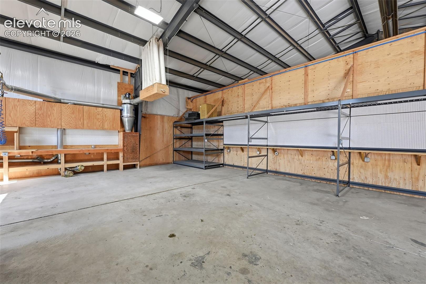 Workshop cabinetry: Built-in cabinetry and countertops create a ready-to-use work area