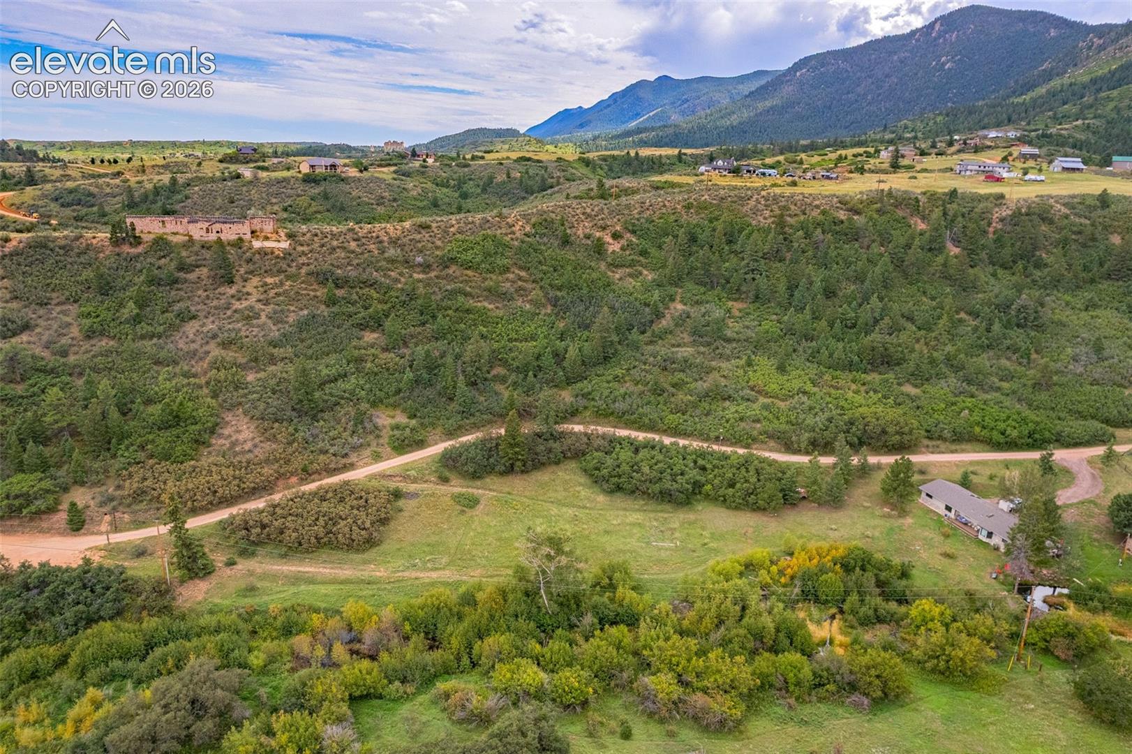 Expansive mountain landscape with diverse natural vegetation