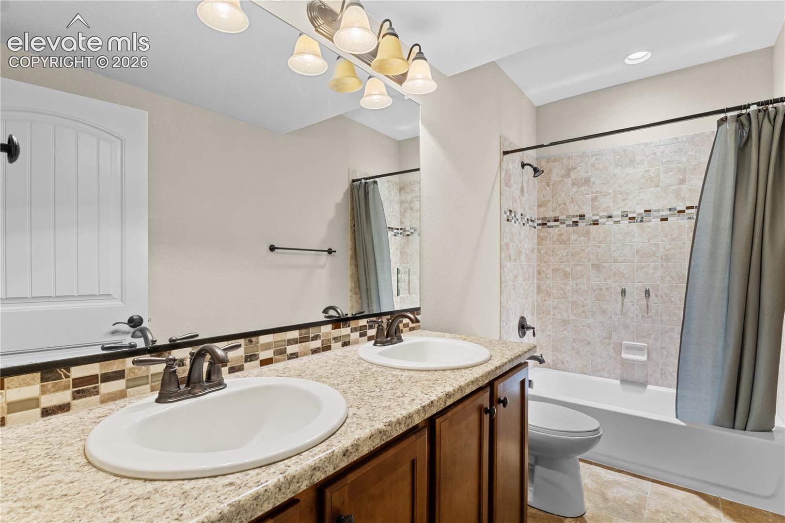 Large full bathroom in the basement, convenient for bedrooms.