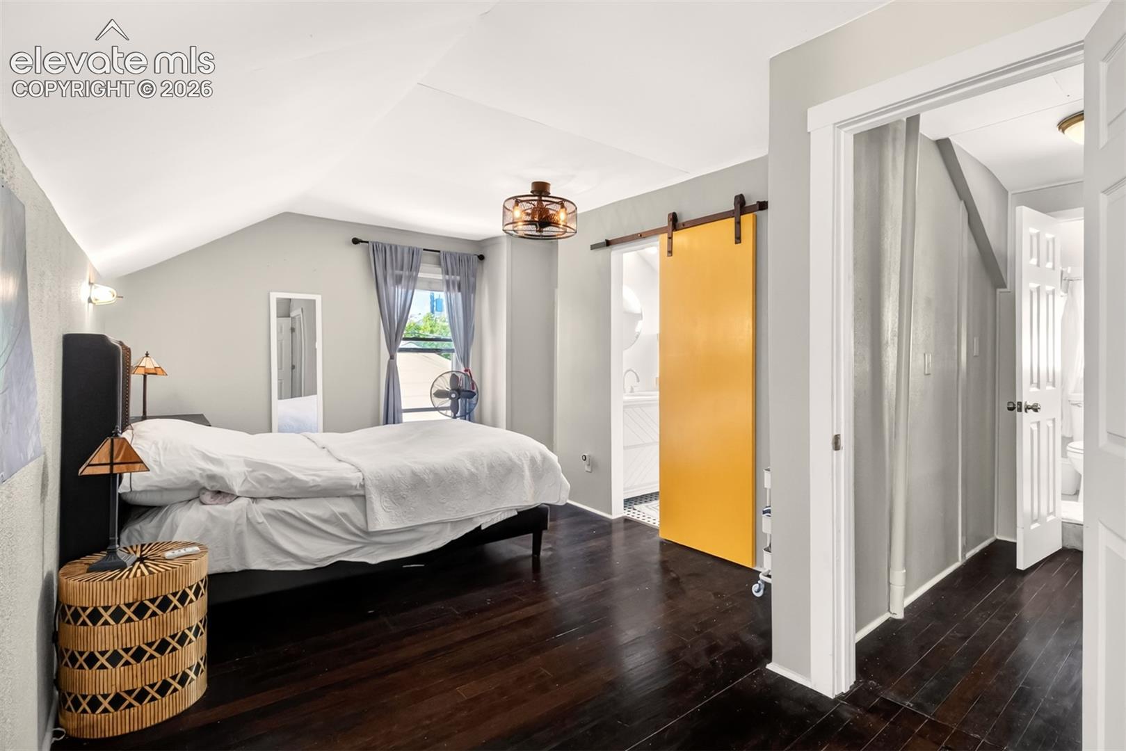 Upper level bedroom with attached bathroom