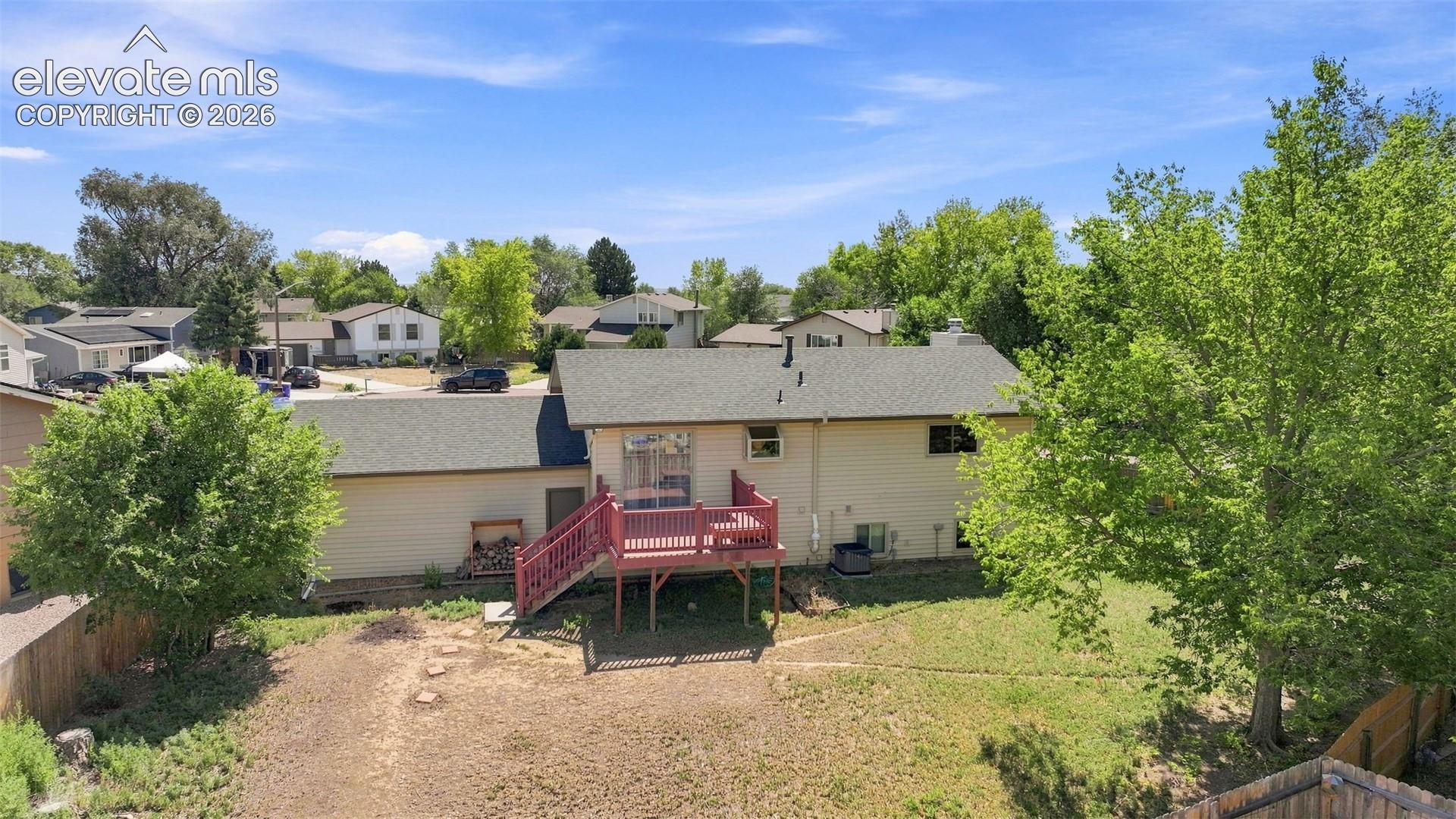 View of back deck and home