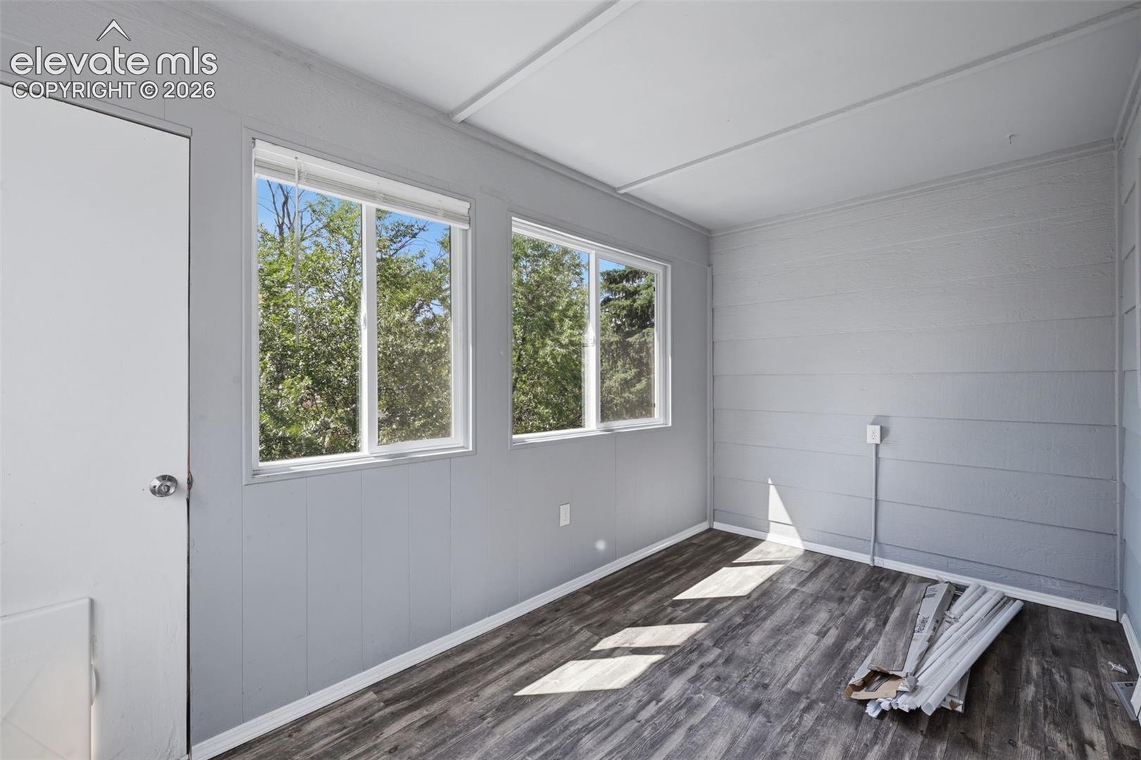 Sunroom off of kitchen, could be used for storage, pets, summer eating or morning coffee