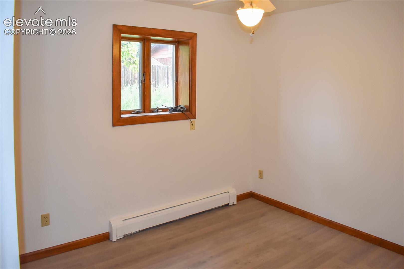 Wood-finish flooring with coordinating wood trim