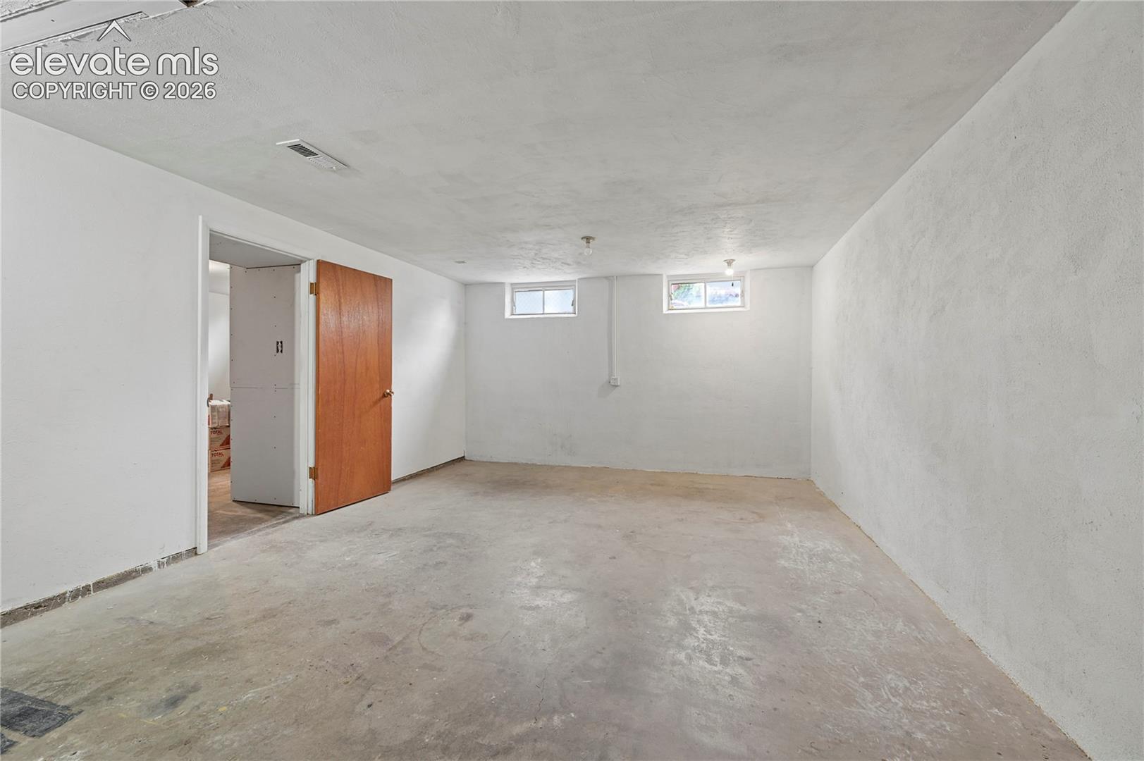 Basement Family Room (Looking Towards Basement Bedroom & Bathroom)