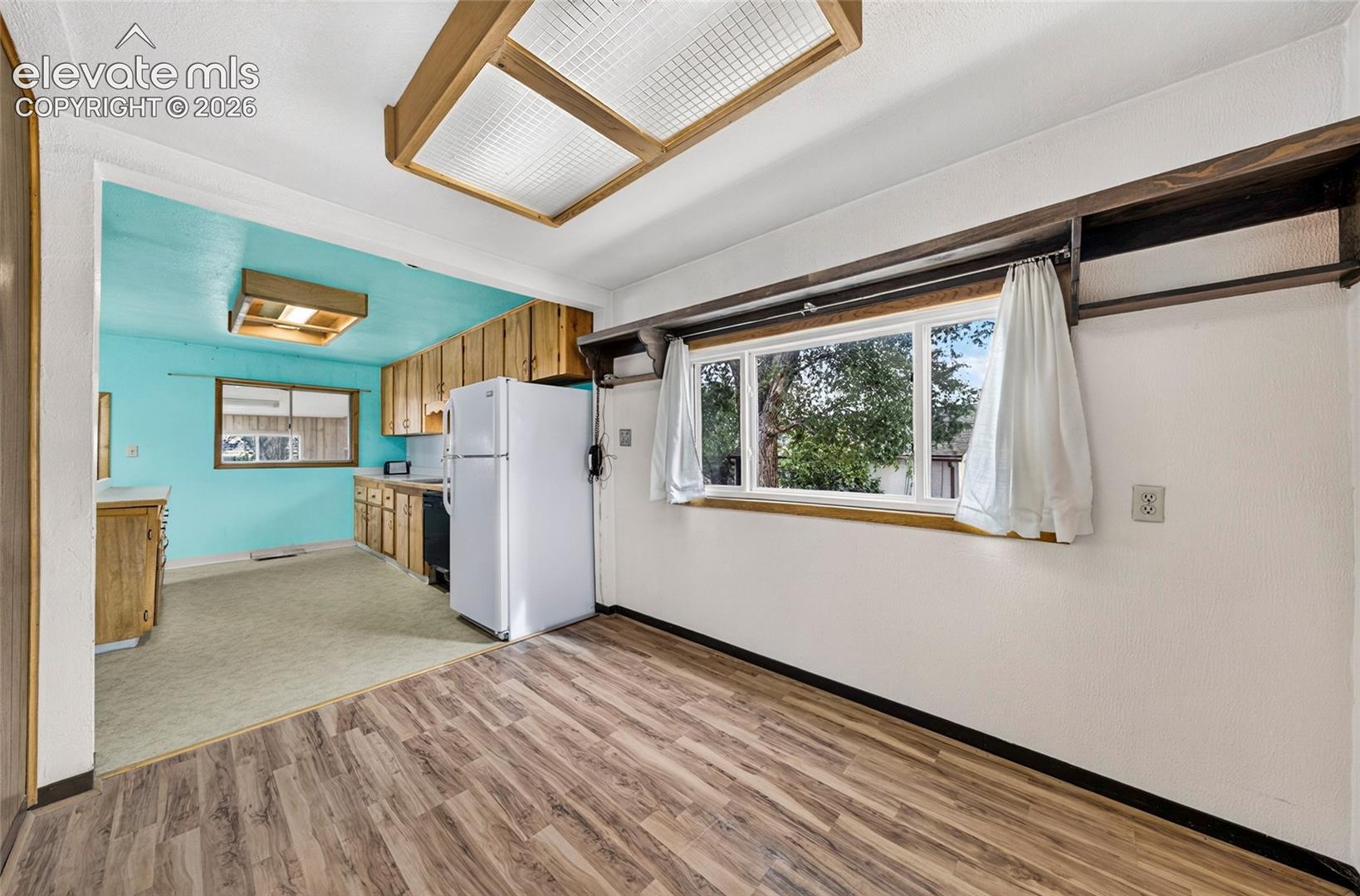 Dining area between living room and kitchen