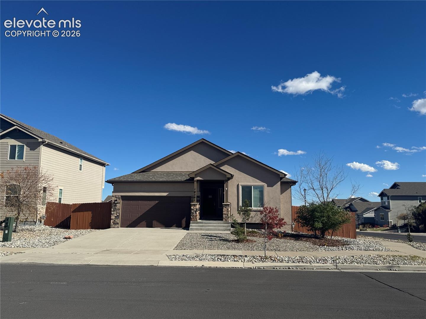 Beautiful 5 Bed/3 Bath/2 Car Ranch Home in the desirable Meridian Ranch community in Northeast Colorado Springs. Beautiful Luxury Vinyl Plank flooring greets you upon entry and flows throughout the Kitchen and Living areas. The Kitchen has Stainless Appliances, Gas Range Oven, and Granite Counters. The Great Room Includes Gas Fireplace and walk out to the composite deck with huge backyard on a corner lot. The Main Level has the master bedroom with 5 piece en-suite, and two additional bedrooms toward the front of the house. Main level laundry, washer & dryer included. The basement has 2 bedrooms, and a huge family room with great natural light. Enjoy the Amenities of the Recreation Centers & Trails in this wonderful Meridian Ranch Community! Come See it Today!